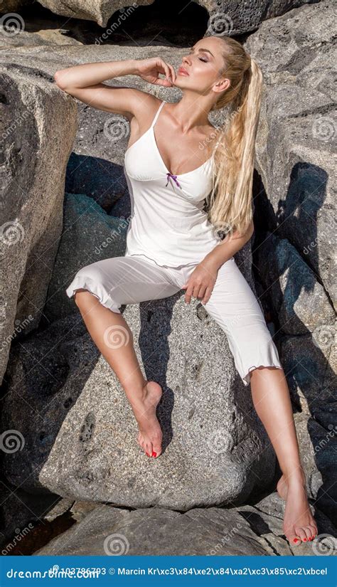 Blonde Female Model Sitting On Rocks Stock Image Image Of Lingerie Rocks 103786793