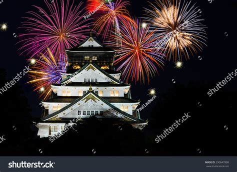 Osaka Castle In Osaka, Japan With Fireworks In The Background And Copy ...