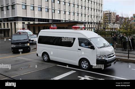 A Motorcade Believed To Be Carrying Defendants Satoru Nomura And Fumio