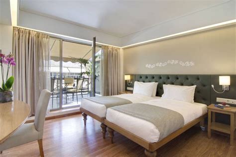 Titania Hotel in Panepistimiou Ave, Athens | Greeka