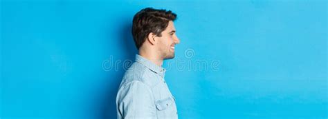 Profile Of Handsome Young Man Looking Left Smiling Happy Standing