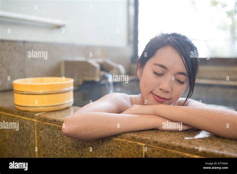 Woman Enjoy Hot Springs In Japanese Onsen Stock Photo Alamy