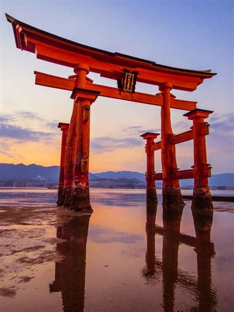 Great Torii Of Itsukushima Shinto Shrine At Sunset Stock Image Image