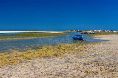 Beautiful View Of The Boat In The Bay Of The Mediterranean Sea At Low