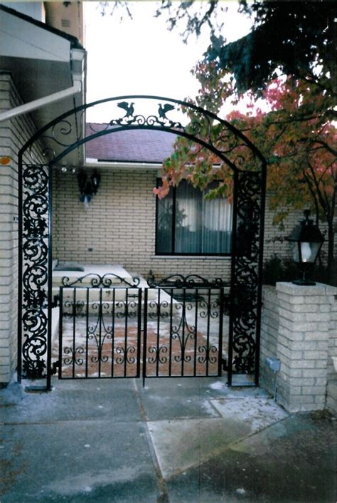 Custom Iron Arch With Double Pedestrian Gates