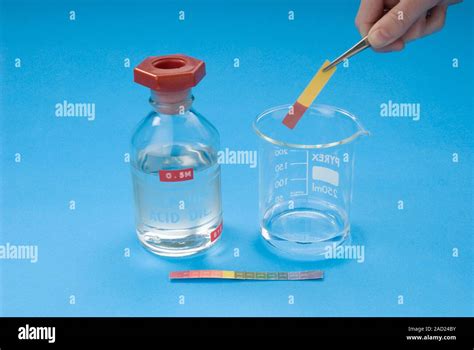 Universal Indicator Paper Being Used To Test The Ph Of Dilute Sulphuric