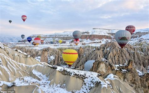 Hot air balloons captured floating above ancient Cappadocian landscape | Daily Mail Online