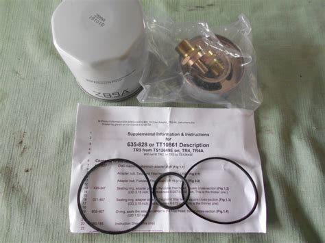 Spin On Oil Filter Conversion Kit Has Fine Course Thread Triumph