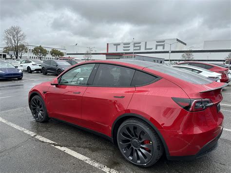 Teslas Latest Ultra Red Gets Real World Comparison With Multi Coat Red