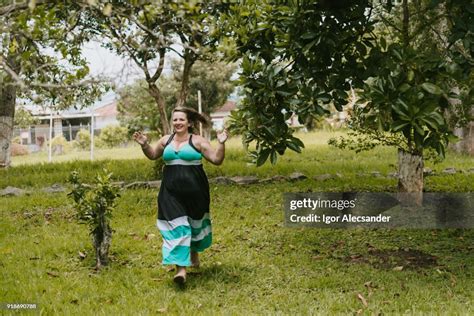 Body Positive Woman High-Res Stock Photo - Getty Images