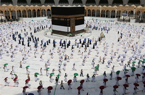 Stunning Photos Show Socially Distanced Pilgrims Attending Hajj In