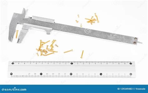 Calipers Metallic Ruler And Many Of Brass Screws Stock Image Image Of Metallic Machinery