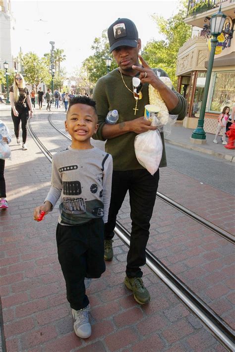 Ne-Yo spends the day with his kids at Disney California Adventure ...