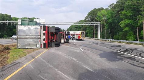 Tractor Trailer Overturns After Crash With Garbage Truck On Raeford