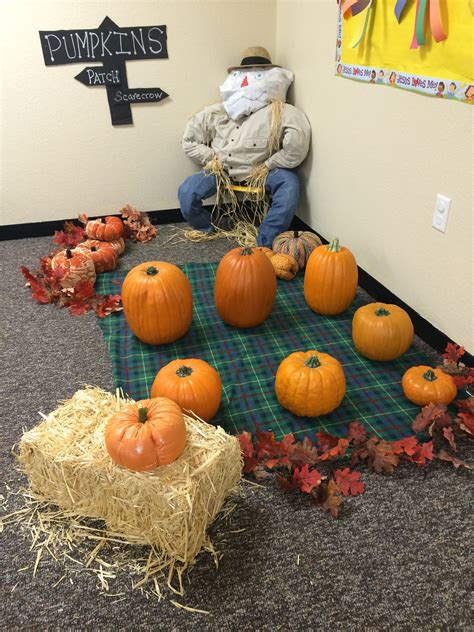 Dramatic play pumpkin patch I did for my classroom... Had the kids help make the scarecrow ...