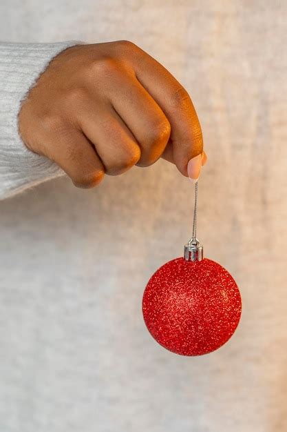 Premium Photo Red Ball Ornament On The Christmas Tree