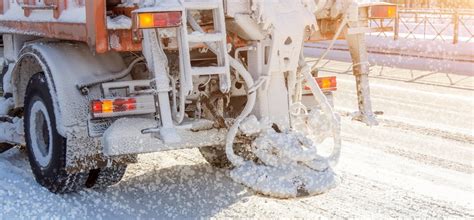 Snow Plow On Highway Salting Road Orange Truck Deicing Street Stock