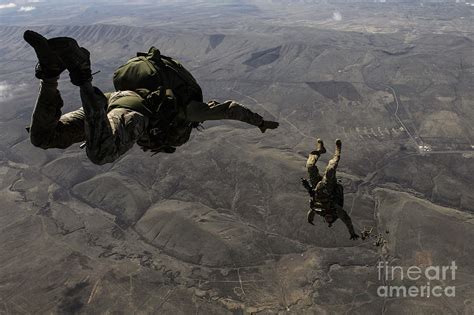 U.s. Army Soldiers Conduct A Halo Jump Photograph by Stocktrek Images - Fine Art America