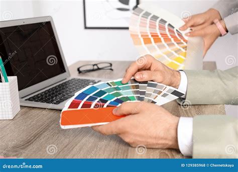 Team Of Designers Working With Color Palettes Stock Photo Image Of