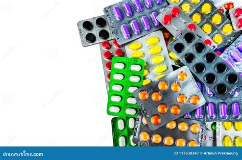 Many of Tablet Pills Isolated on White Background. Yellow, Purple ...