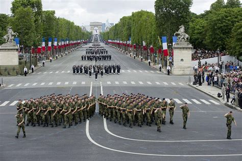 The July 14th Bastille Day Military Parade Held In Paris France Happy