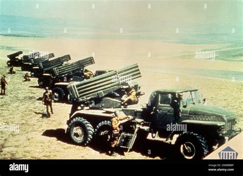 A right side view of six Soviet 122mm BM-21 multiple rocket launcher ...