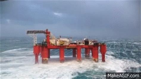 Huge Waves Crash Against Swaying North Sea Oil Rig On Make A