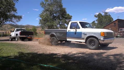 Watch 1991 Ford F-150 Fight 1995 Dodge Ram In Tug-Of-War Match