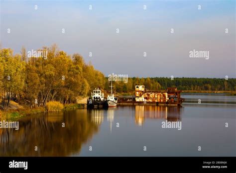 Rusty Shipwrecks On Pripyat River In The Chernobyl Exclusion Zone As