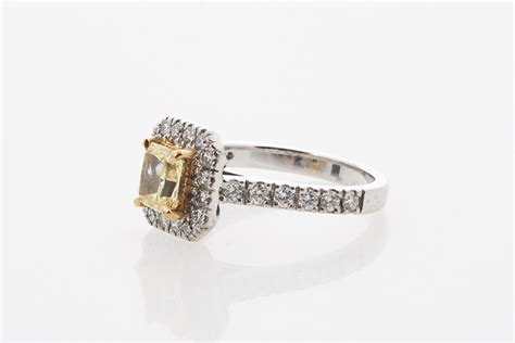 Yellow Diamond Halo Ring - Shapiro Auctioneers