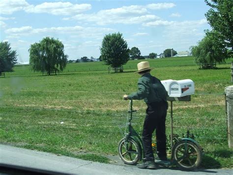 Amish Boy And His Scooter Amish Amish Country Amish Culture