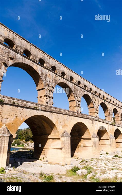 The Pont Du Gard An Ancient Roman Aqueduct Bridge That Crosses The