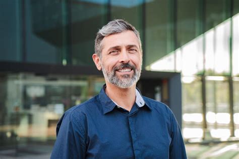 Premium Photo Bearded Mature Man Smiling And Looking At Camera Middle