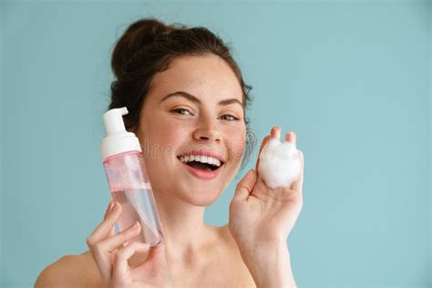 Half Naked Brunette Woman Smiling While Showing Cleaning Foam Stock