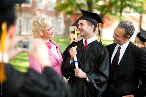 "Graduation: Parents Proud Of Son Graduating From School" by Stocksy ...