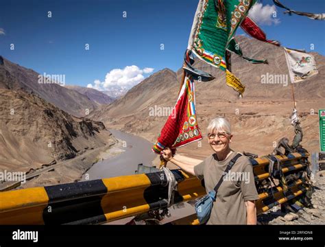 India Jandk Ladakh Sangam Senior Female Tourist Under Buddhist Flag