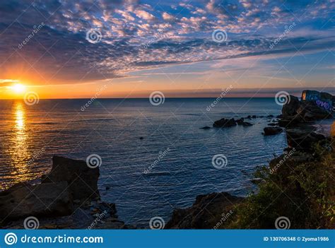 Seascape With Stones And Nice Sky During The Sunset Stock Photo Image