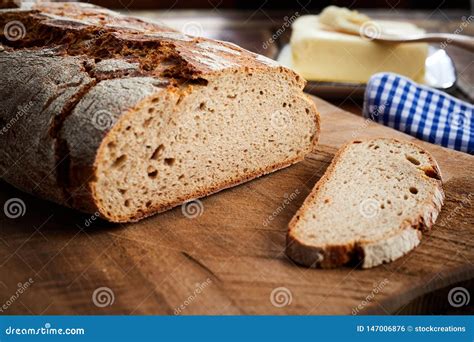 Freshly Baked Sliced Loaf Of Rye Bread In Closeup Stock Photo Image