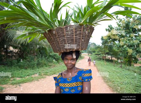 Woman Carrying Basket On Her Head Dakoto Junction Ghana Africa Stock