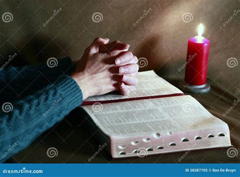 Praying with Bible and Burning Candle Stock Image - Image of peace, human: 38387705