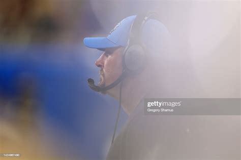 Head Coach Dan Campbell Of The Detroit Lions Looks On From The News