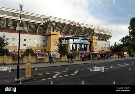 Fans make their way to Upton Park before kick off Stock Photo - Alamy