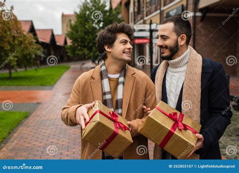 Happy Gay Couple In Trendy Coats Stock Image Image Of Blur Festive