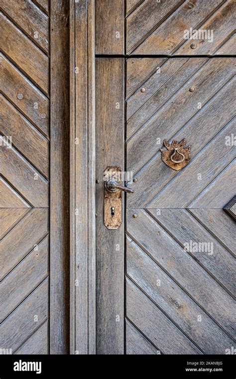 Old Wooden Door With Rusty Door Handle And Knocker Stock Photo Alamy