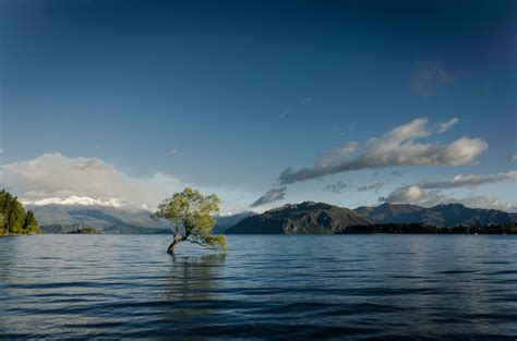 Royalty Free Photo Rippling Body Of Water With Background Of Mountains