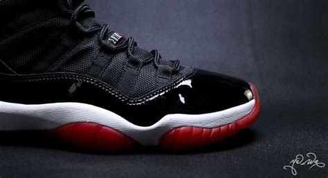 All Black Jordans With Red Bottom