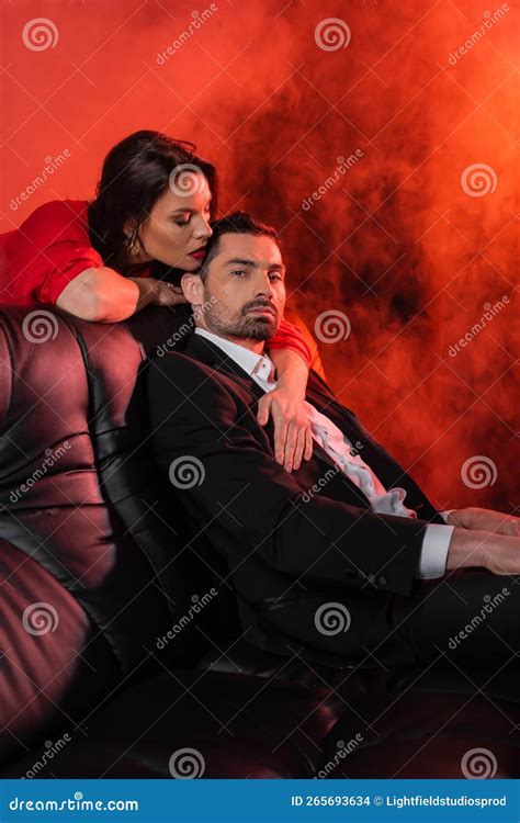 Brunette Woman Seducing Boyfriend In Formal Stock Photo Image Of