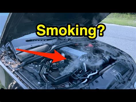 Car Smoking Under Hood And Burning Smell