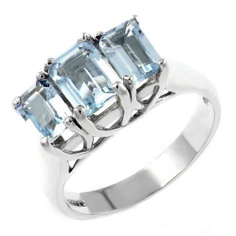 9ct White Gold 7x5mm 6x4mm Emerald Cut Aquamarine 3 Stone Ring