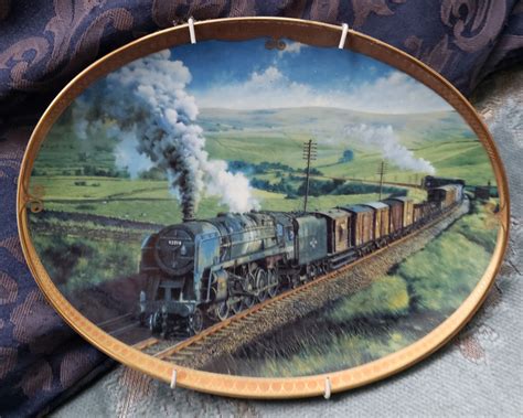 Solve Ornamental Plate Featuring A Steam Locomotive Jigsaw Puzzle